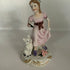 Vintage Capodimonte style porcelain figurine of a girl with a cat, Italy