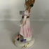 Vintage Capodimonte style porcelain figurine of a girl with a cat, Italy