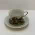 Vintage Occupied Japan porcelain demitasse cup and saucer with courting couple scene
