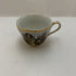 Vintage Occupied Japan porcelain demitasse cup and saucer with courting couple scene