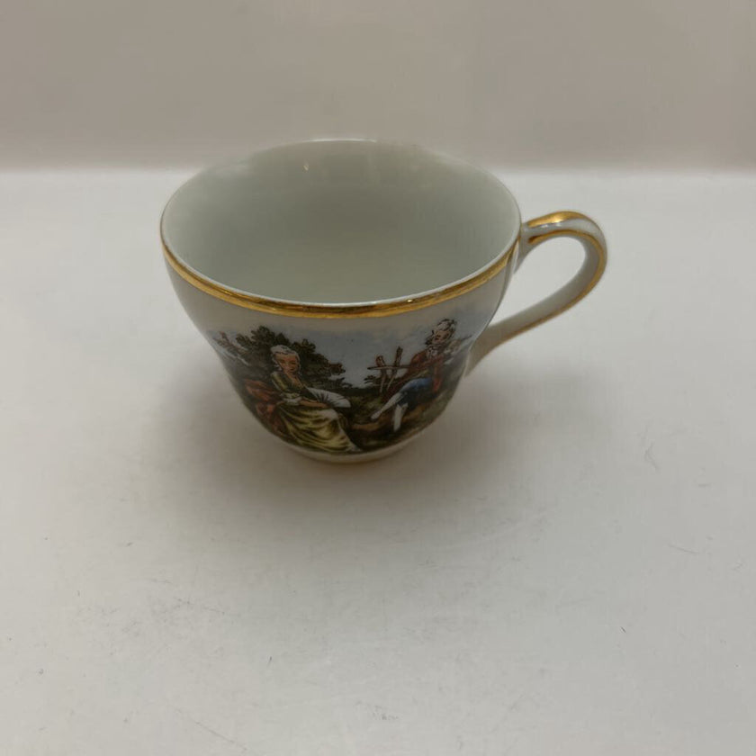 Vintage Occupied Japan porcelain demitasse cup and saucer with courting couple scene