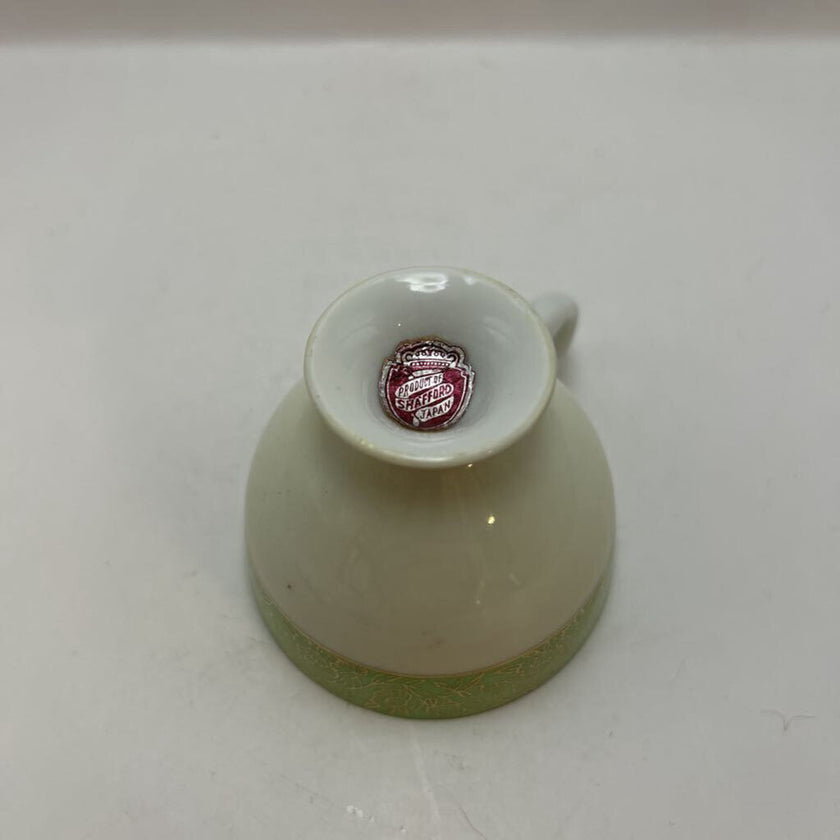 Vintage English fine bone china teacup and saucer with green floral pattern