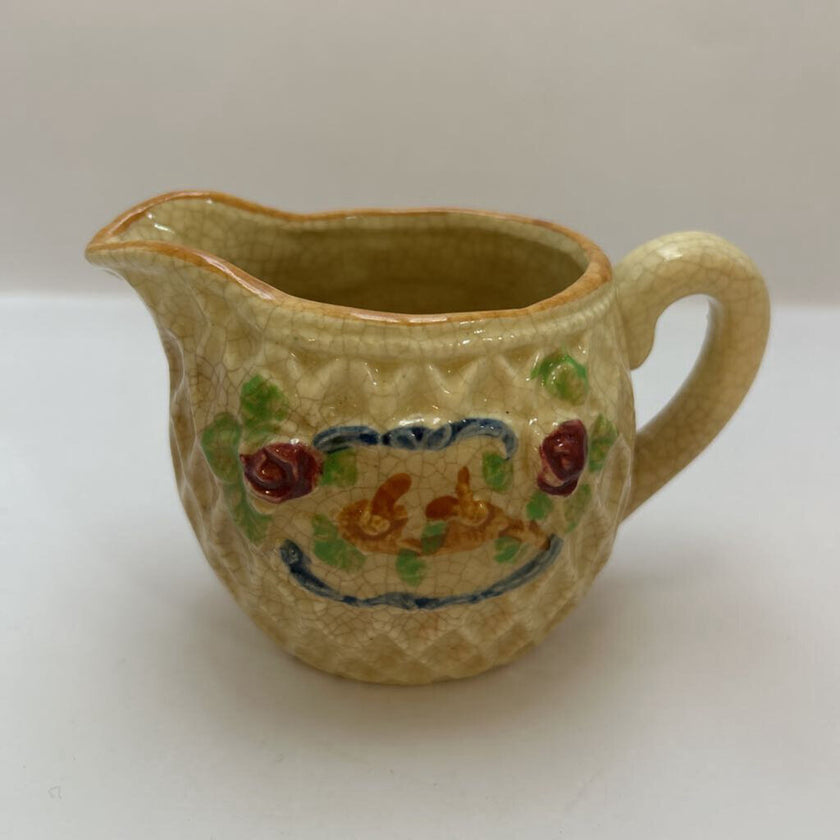 Small basket weave /floral creamer