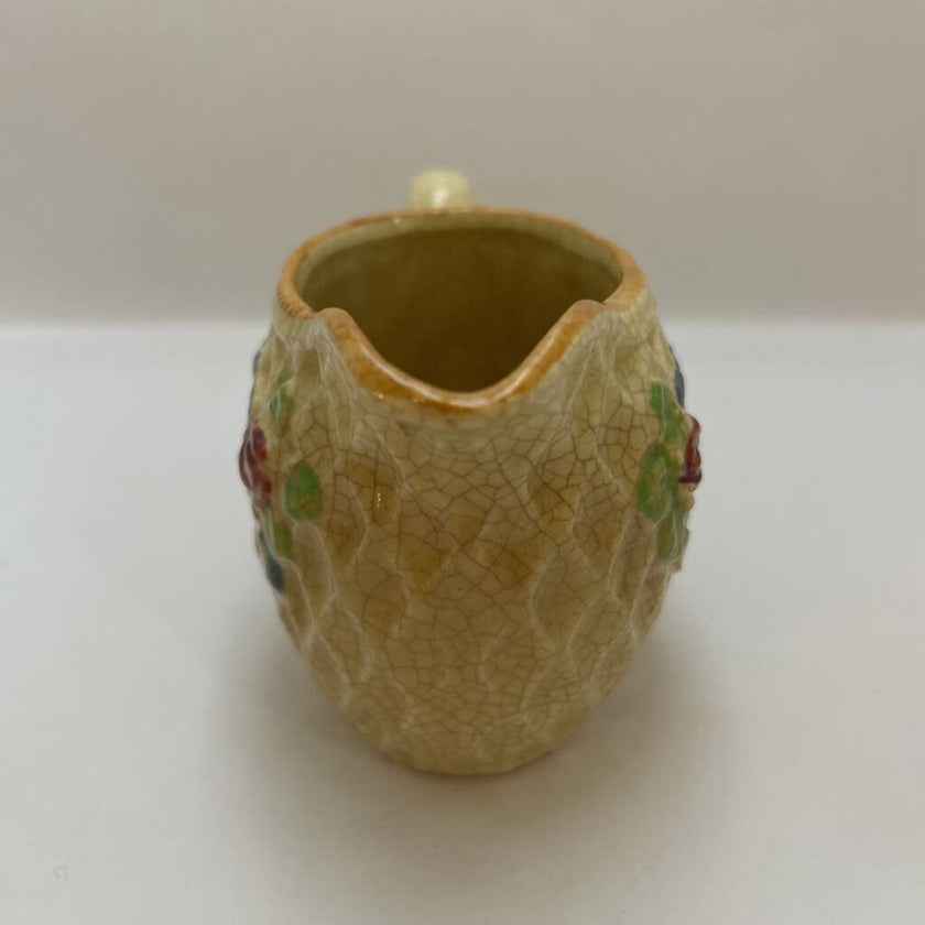 Small basket weave /floral creamer