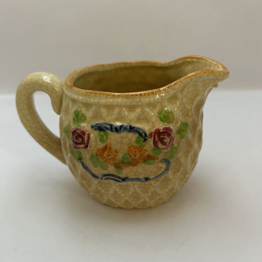 Small basket weave /floral creamer