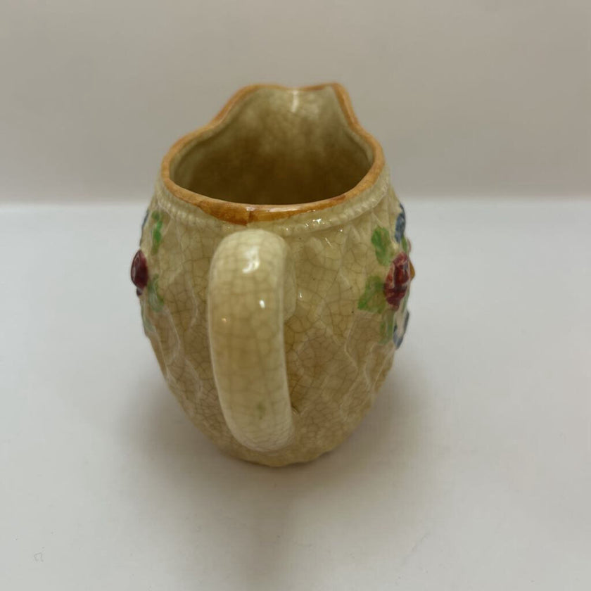 Small basket weave /floral creamer