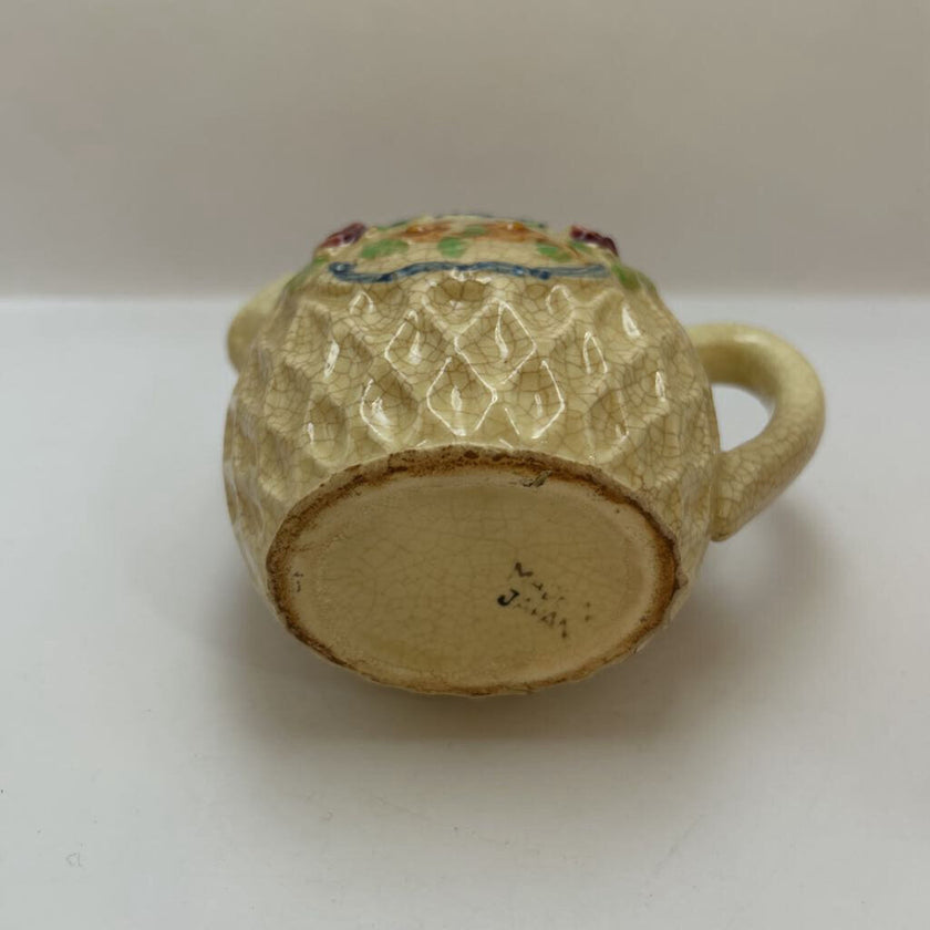 Small basket weave /floral creamer