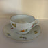Vintage Meissen porcelain teacup and saucer with scattered floral pattern
