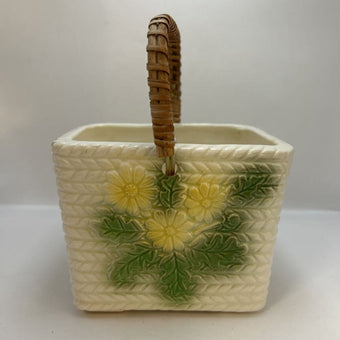 White basket with yellow flowers