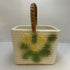 White basket with yellow flowers
