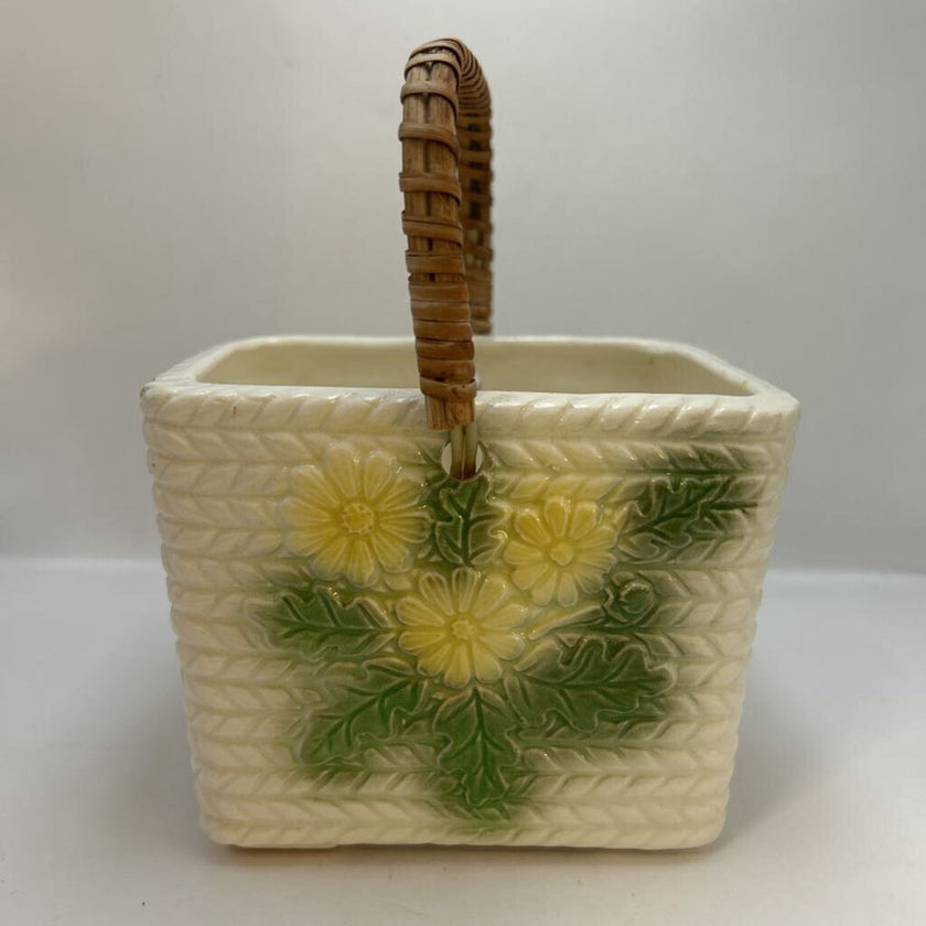 White basket with yellow flowers
