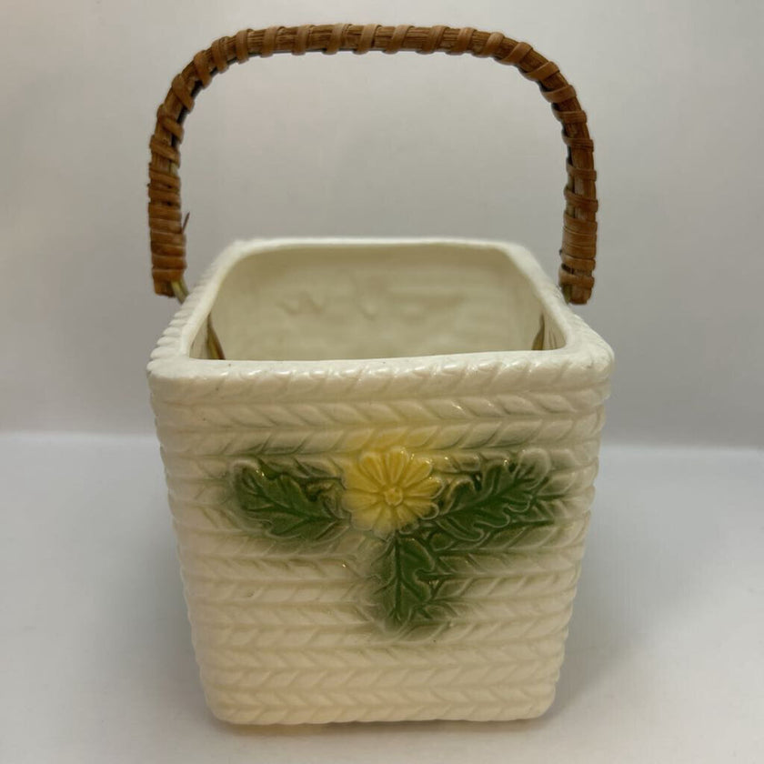White basket with yellow flowers