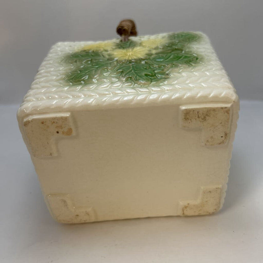 White basket with yellow flowers