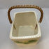 White basket with yellow flowers