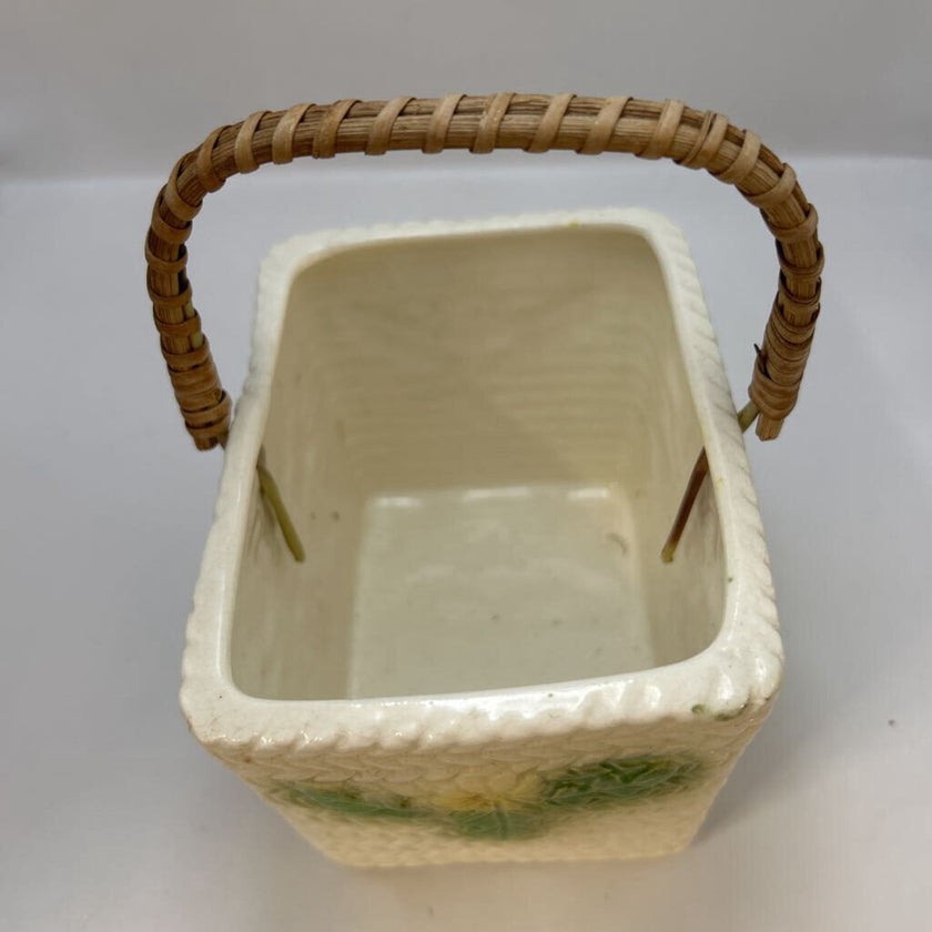 White basket with yellow flowers