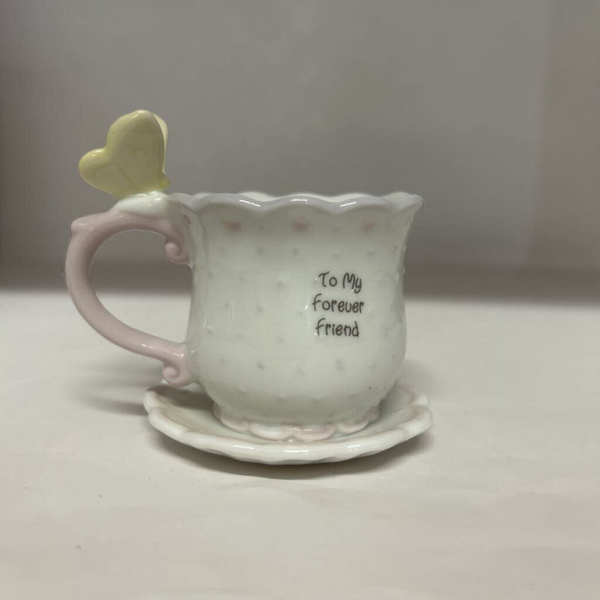 Precious moments cup and saucer