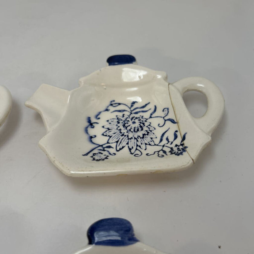 4 Teapot Spoon Rests Plus Catty