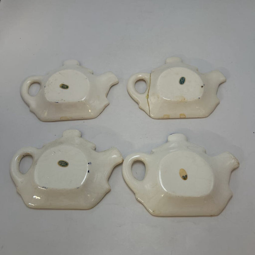 4 Teapot Spoon Rests Plus Catty