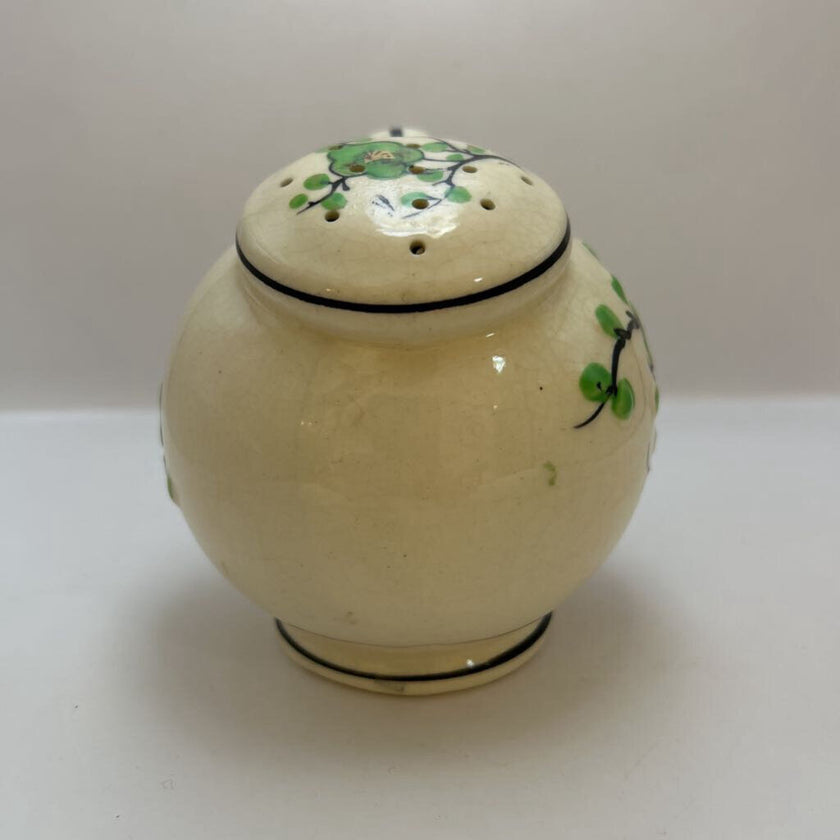 Vintage hand-painted ceramic shaker with green floral design, made in Japan.