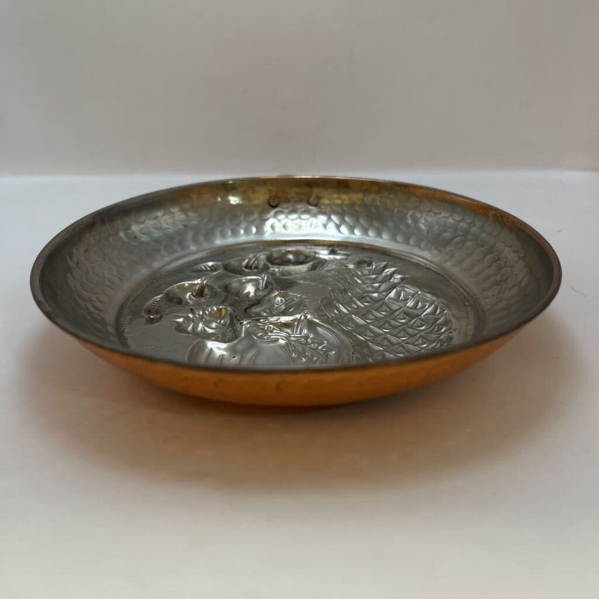 Vintage Italian copper jelly mold with embossed pineapple and fruit design.