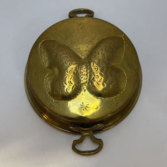 Butterfly brass mold
